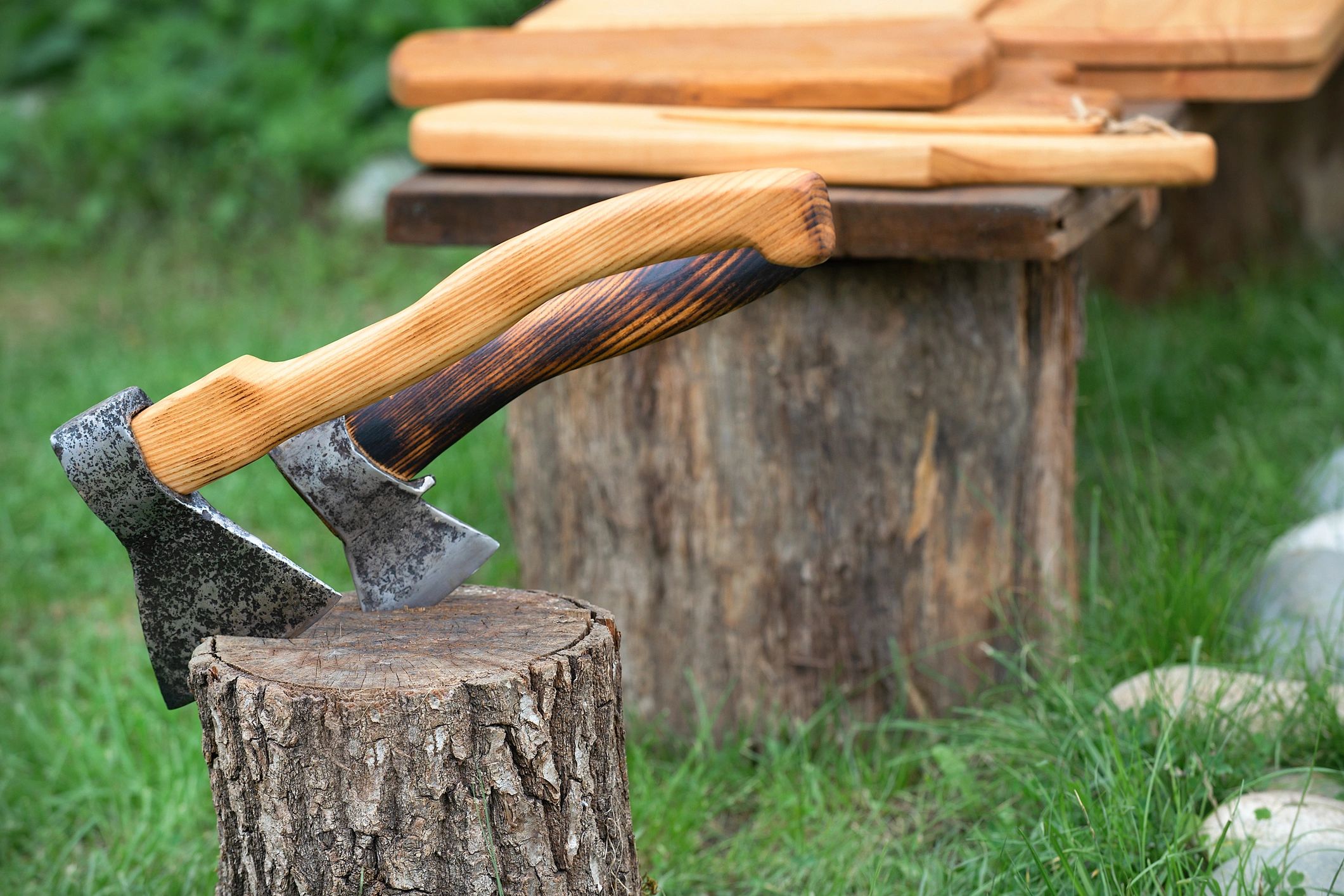 Two new axes on a background of wooden